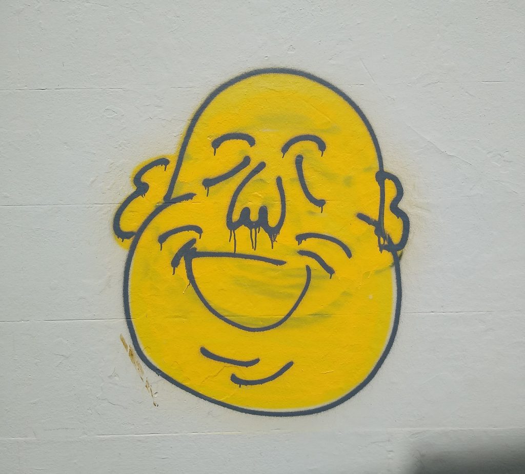Little Joys: smiling face graffiti