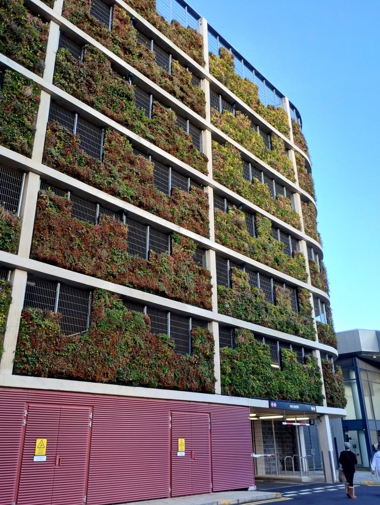 Photo: a living wall six storeys high on a multi-storey car park.